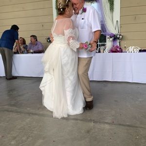 Wedding dress used once and dry cleaned size 20